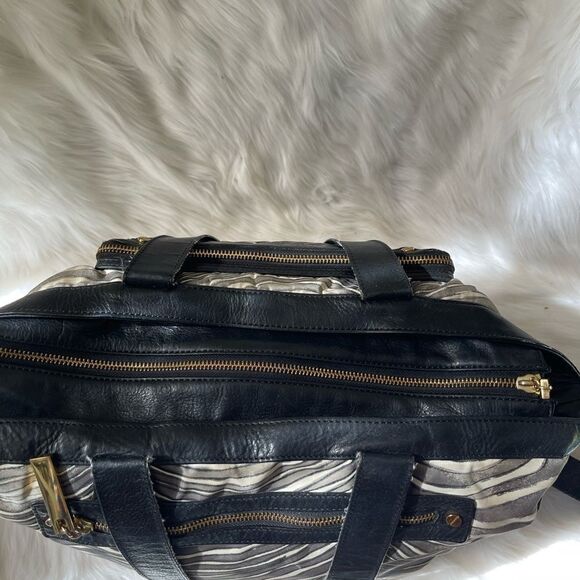 - Tory Burch Nylon Zebra prints & black leather Weekender bag with shoul… - Picture 6 of 15